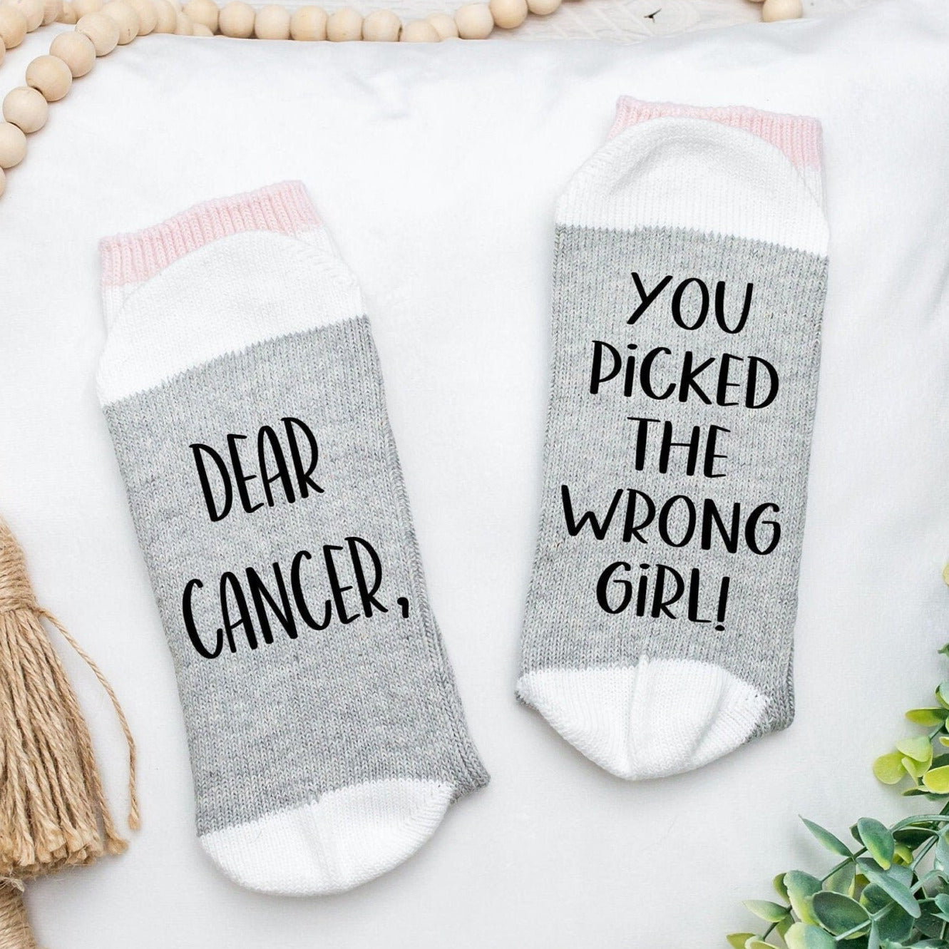 Cher Cancer, tu as choisi les mauvaises chaussettes de fille